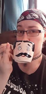 Fun white mug with black mustache. $10 or best offer.
