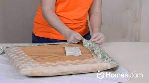 Not all chairs are made the same, but most will have a simple seat cushion that's attached to the base via a set of screws. Homes Com Diy Experts Share How To Recover A Chair Cushion Youtube
