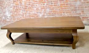 My aunt asked me about an oak coffee table she had. 66in Oak Coffee Table In Antique Walnut Finish Ecustomfinishes