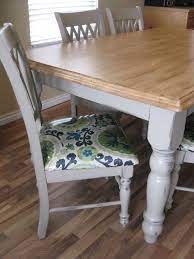 Create a cozy breakfast nook. Recovering Dining Chairs Painted Grey Table With Stained Top Recovered Dining Chairs Gray Dining Chairs Wood Table Black Chairs