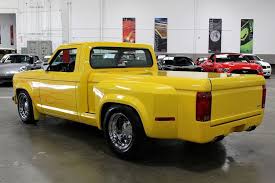 Image result for Bright Yellow 1990 Truck