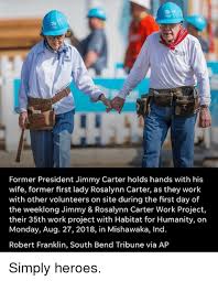 Former president jimmy carter walked across the stage at nashville's historic ryman auditorium sunday night, an atlanta braves ball cap on his head and a white but he wasn't going to let a little bump keep him from getting on a plane to music city for this week's habitat for humanity project. Former President Jimmy Carter Holds Hands With His Wife Former First Lady Rosalynn Carter As They Work With Other Volunteers On Site During The First Day Of The Weeklong Jimmy Rosalynn