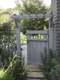 This stop can be a small piece of wood extending from the gate, which catches the post when it shuts. Top 10 Diy Garden Gates Ideas Garden Gates And Fencing Garden Gate Design Wooden Garden Gate
