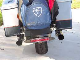 A tail bag may be right for you if you want to be able to easily load your bike up and strip it down and so don't want to permanently mount any luggage. Motorcycle Golf Bag Carrier 2x2 Cycles