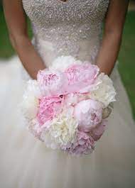 But we think pink peonies are a great pick for any occasion. A Destination Wedding At The Disney Aulani Resort In Hawaii Disney Wedding Wedding Flower Bouquet Wedding