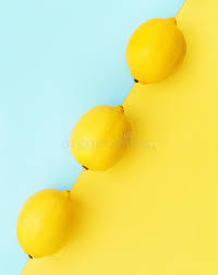 Yellow brick facade under teal blue sky. Lemon Pattern On Pastel Yellow Background Minimal Summer Concept Flat Lay Stock Photo Image Of Juicy Minimalism 149574630