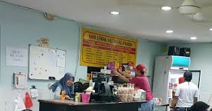 The rice in nasi lemak is cooked in much the same way as rice is cooked in water except that the water is substituted with coconut milk. Nasi Lemak Saleha Kg Pandan