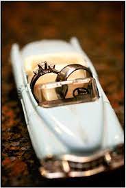 Ring Shot In A Diecast Car Wedding Rings Photos Ring Shots Car Themed Wedding