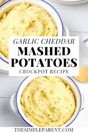 These Slow Cooker Mashed Potatoes Are Cheesy And Have A Pop Of Garlic They Re Great For Garlic Mashed Potatoes Mashed Potato Recipes Crockpot Mashed Potatoes