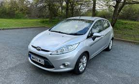 Image result for Moondust Silver 2010 Ford