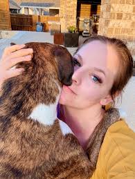 Mom and Son's Special Bond with Their Boxer