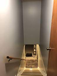 The New Grey Paint Color On The Stair Walls In The Basement All Of The Colors Are Coming Together So Nicely Stair Walls Grey Paint Colors Home Remodeling