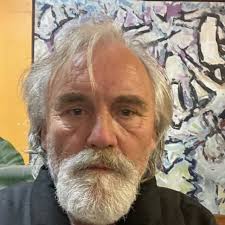 He might like creepy. If he interprets it as creepy that's coming from him,  his view. Someone else might say moody, atmospheric or sensitive or  thoughtful. Try to not let him bother