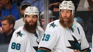 Sharks center joe thornton (19) takes a shot against the calgary flames in the first period of thornton shaved off his prodigious beard monday night, and showed up to sharks practice tuesday. Joe Thornton Brent Burns Cheer On Fan S Sick Beard