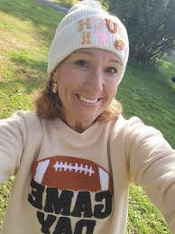 Mom watching favorite quarterback play pee-wee game