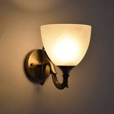 The sleek adjustable tubular arm holds the aluminum shade and led downlight panel. Wall Lights Buy Decorative Wall Lights Online For Your Home Urban Ladder