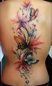 My name is stacey and i love the tattoos here. 43 Lily With Butterfly Tattoos Ideas