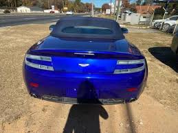 Image result for Midnight Blue 2010 Aston Martin