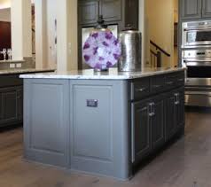 These corner diagonal cabinets maximize storage space with open cubbies for a microwave, small tv and cookbooks. Kitchen Cabinet Design Island Options Burrows Cabinets Central Texas Builder Direct Custom Cabinets