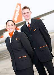 The current ones in use were designed by french designer christian lacroix. Easyjet Stewardessen Uniform