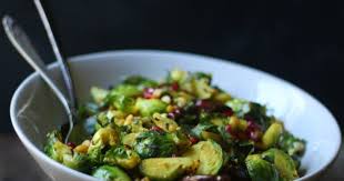 Curried Crisp Pan Roasted Brussels Sprouts With Pomegranate And Peanuts South Indian Style Food Fashion Roasted Brussel Sprouts Brussel Sprouts Savoury Food