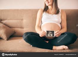 Pregnant Woman Big Belly Sitting Sofa Home Showing Ultrasound Image Stock Photo By C Anatoliy Gleb 235959078
