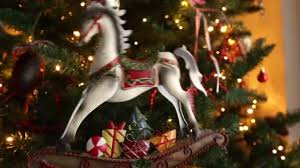 El mejor video de navidad para amigos. Decorative Christmas Horse Moving Front Christmas Tree Stock Video C Photo Stella 177963550