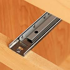These slides incorporate either ball bearings or rollers for smooth operation. Close Up Of Metal Slide Drawer Slides Diy Bottom Mount Drawer Slides Furniture Makeover Diy