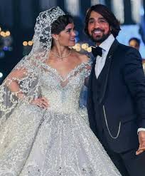 في 2017، شاركت الممثلة يسرا اللوزي في عرض الأزياء وارتدت فستانا مرصعا بالماسات ووصل سعره إلى. Ø£Ù†Ø§ Ø§Ù„Ø¹Ø±ÙˆØ³Ù‡ ÙŠØ³Ø±Ø§ Ø§Ù„Ù„ÙˆØ²ÙŠ Ù…ØªØ£Ù„Ù‚Ø© ÙÙŠ Ø¯ÙŠÙÙŠÙ„ÙŠÙ‡ Ù‡Ø§Ù†ÙŠ Ø§Ù„Ø¨Ø­ÙŠØ±ÙŠ Facebook
