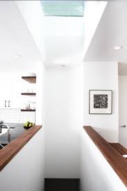 Houzz Tour 1950s Hilltop Home Gets A Dose Of Modern Style Stairs In Kitchen Open Basement Stairs Basement Stairs