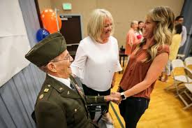 Identical twins celebrate 99th birthdays, share WWII stories