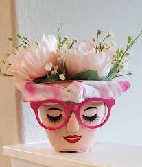 I made a pot lady today. It's not perfect but I love it! Edited to answer  some questions. 1. The pot is plastic approximately 10” across the top and  8” high. (It