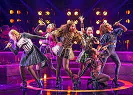 A rock 'n' roll band with horns. Divorced Beheaded Broadway The New York Times