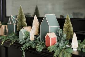 This display is actually two pieces that fit together made for ease of use and storage. Make Your Own Christmas Village Magnolia