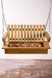 A cute bird feeder made to look like a miniature porch swing. Porch Swing Bird Feeder Porch Swing Bird Feeders Bird House Feeder