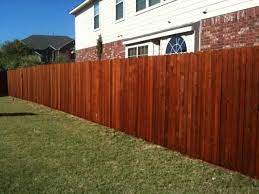 You may need to repeat this process two or three times when you begin because your roller cover will be dry and will soak up the stain. How To Stain A Fence Rustic Fence Fence Company Serving Dallas Fort Worth