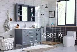 Boasting a solid neutral finish features two drawers and one cabinet for keeping crisp towels, cleaning supplies, and other bathroom essentials. Grey Color Bathroom Vanity 28inch With Sink