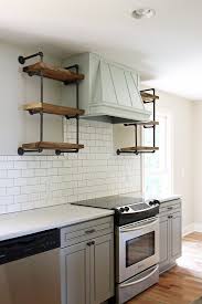 White kitchen backsplash with subway tiles and black quartz. Lakehouse Kitchen Gray Cabinets White Subway Tile 9 Addison S Wonderland