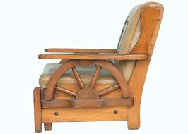 10 inch front solid tires, rear 18 inch spoke wheel with pneumatic tire, 9. Western Style Wagon Wheel Lounge Chair Circa 1950 At 1stdibs