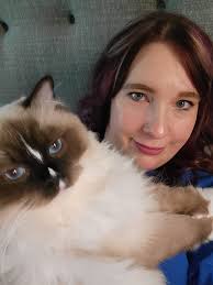 This is KiKi... she is a seal point mitted and 15 weeks... Def has Spunk!  Such great company for our first ragdoll.. Lola