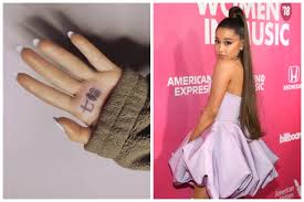 Poor ariana grande proudly tweeted out her painful hand tattoo yesterday that was designed to read 7 rings in japanese, but quickly discovered thanks to adding a kanji to represent 7 finger circle would make the meaning clearer—also, the way she'd originally done it wasn't wrong, per se, just that. Ariana Grande S Japanese Tattoo Mistakenly Reads Bbq Finger She Isn T The Only Celebrity Who Should Regret Her Ink