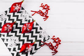 Christmas Toys With Deer On Light Table Free Photo