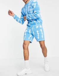 Our latest drop of co ords sets has your matching outfit game nailed. Asos Design Knitted Ribbed Co Ord Shorts With Tie Dye Effect In Blue Asos
