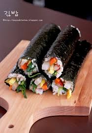 Kimbap A Sort Of Korean Sushi Roll Without Raw Fish You Can Also Make This With Beef Instead Of Crab And Fish Cakes Asian Recipes Korean Food Kimbap