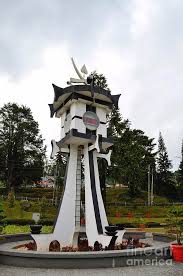 It takes the sun about an hour to travel from the east to the west of the country. Tanah Rata Clock Tower Time And Temperature Readings In Central Town Park Cameron Highlands Malaysia Photograph By Imran Ahmed