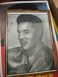 Elvis's Gold Lame' Suit Auction in Fort Wayne, Indiana