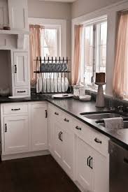 Check out these 10 simple kitchen cabinet repairs you can do. 18 Black Granite White Cabinets Ideas Kitchen Design Black Countertops Kitchen Remodel