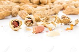 A Pile Of Shelled Big Peanuts With Some Peanut Cracked Open On White Background Stock Photo, Picture And Royalty Free Image. Image 19937281.