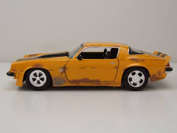 1967 chevrolet camaro ss transformers bumblebee. Modellauto Chevrolet Camaro 1977 Gelb Bumblebee Transformers Modellauto 1 24 Jada Toys 29 95