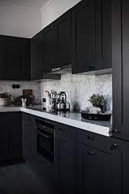 Grey Home With A Black Kitchen Via Coco Lapine Design Kitchen Cabinet Color Schemes Kitchen Cabinet Colors Modern Kitchen Design